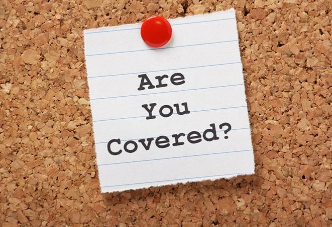 insurance agent calculating motorcycle insurance premium in Huntsville, AL